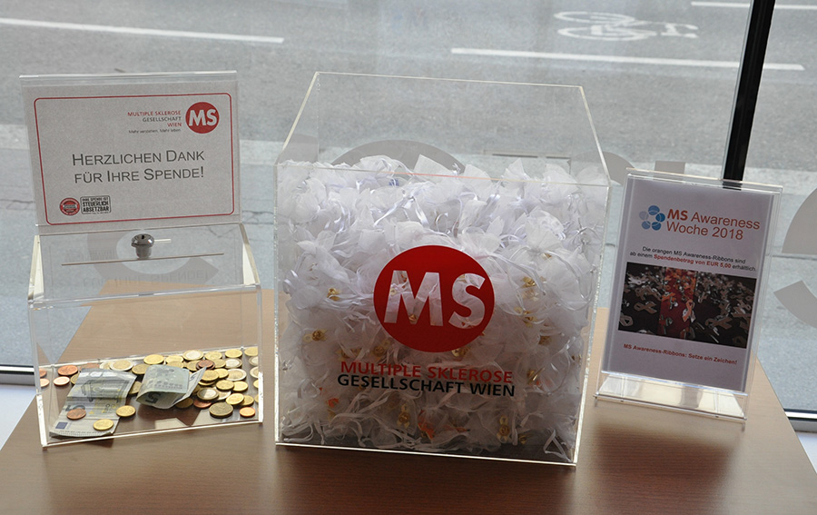MS-Awareness-Ribbons symbolisieren Solidarität mit MS-Betroffenen.